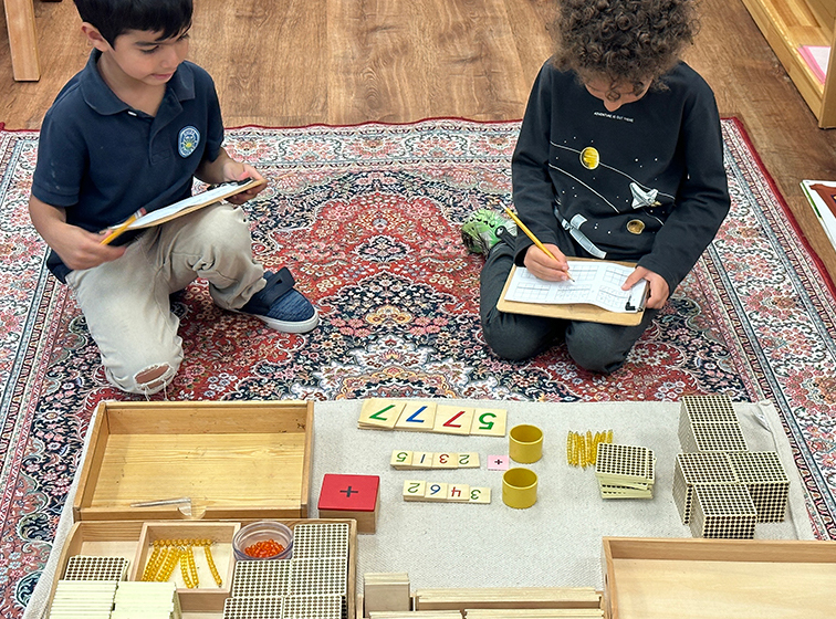 Children engaged in Montessori hands-on activities